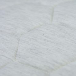 jersey hexagon puff ivory detail kussen naturel grijs taupe hinck amsterdam jersey 50x50cm woonaccessoires met bijzondere texturen met oog voor detail, handgemaakt en of handgeweven